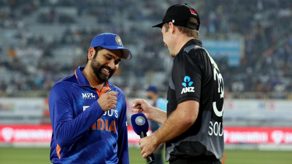 Rohit sharma giving bro fist to new-zealand player